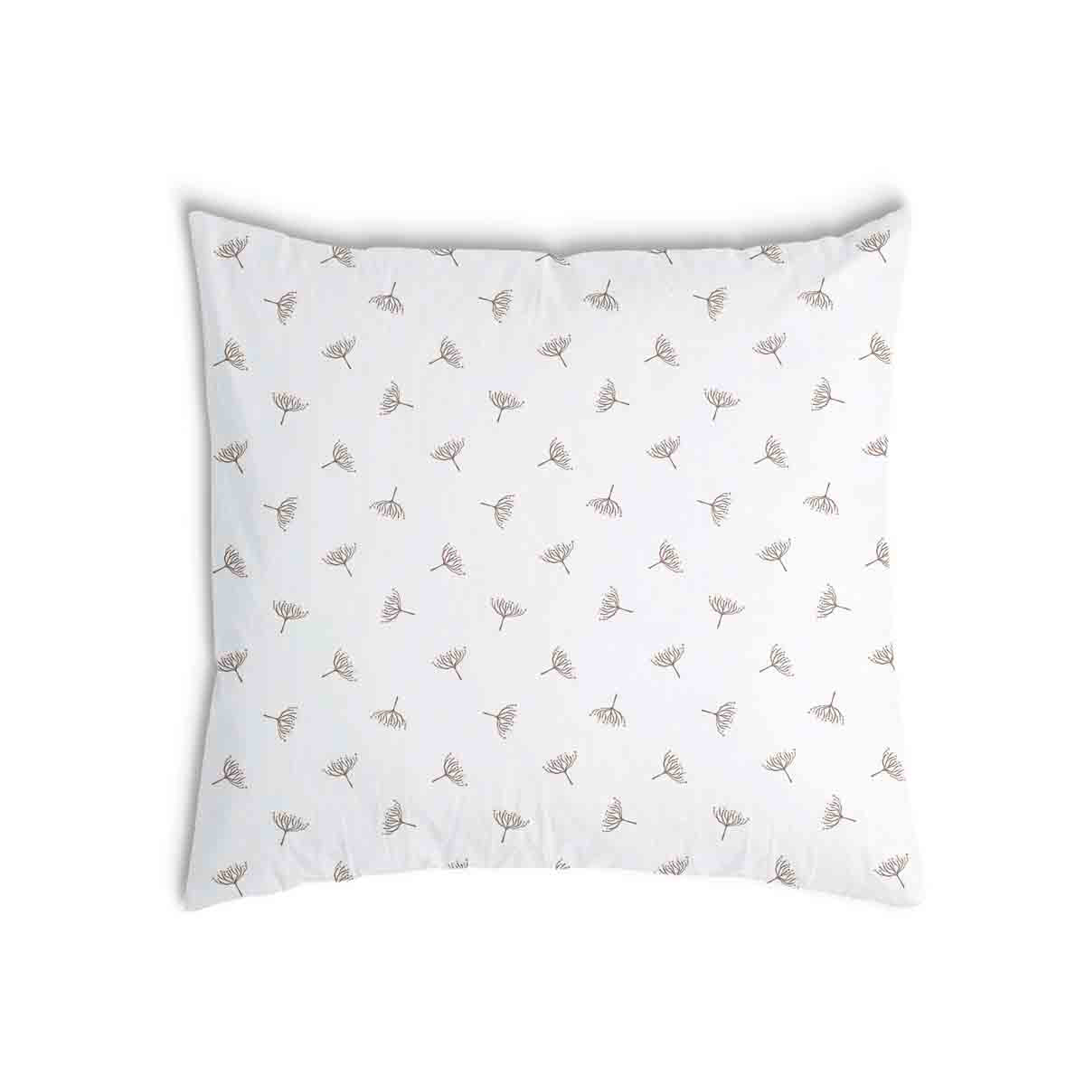 Almohada de salud blanca con pequeñas ramitas de muérdago