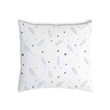 White health pillow with feathers and dots
