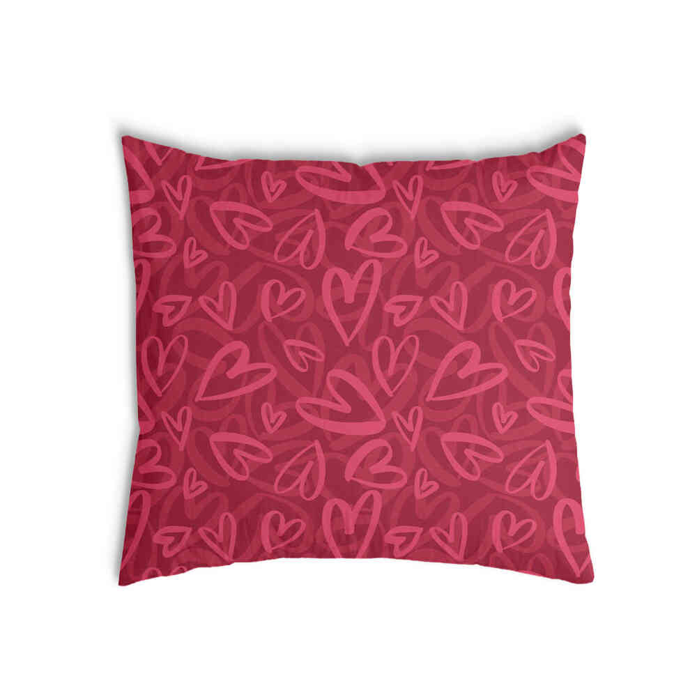 Almohada de salud roja con motivo de corazón rosa