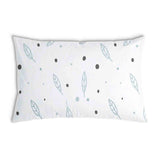 White health pillow with feathers and dots