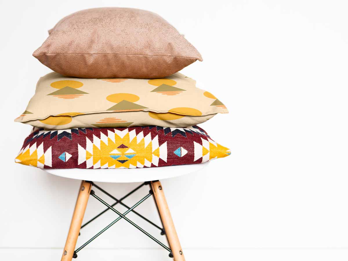 Health pillow with yellow shapes