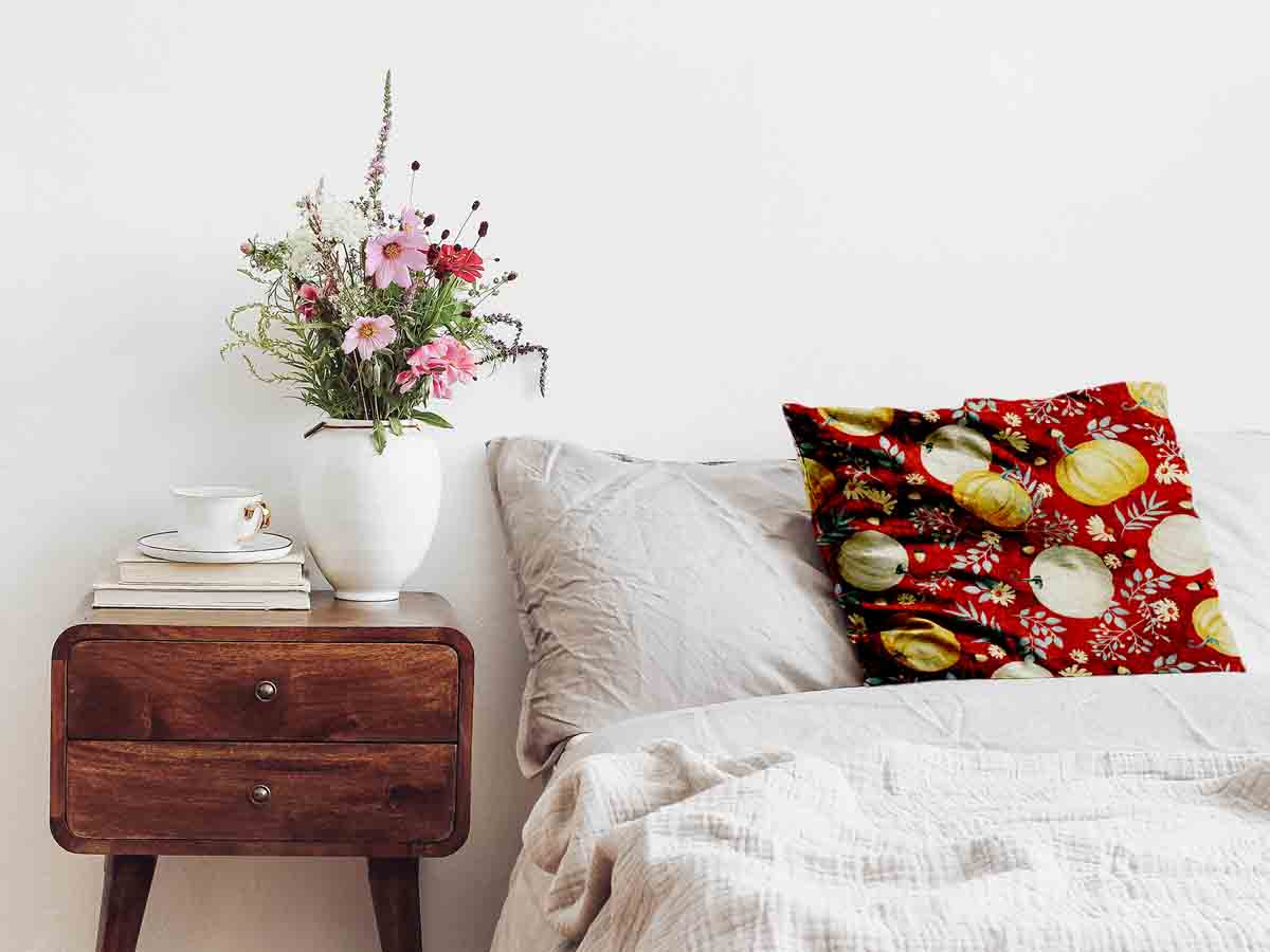 Cuscino sanitario rosso con zucche