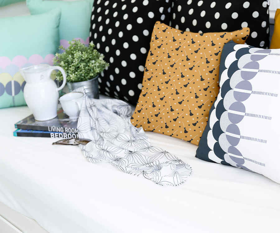 Cuscino salute arancione con scopa di Potter