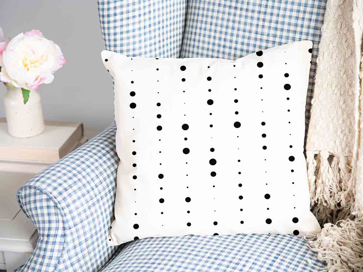 Gezondheidskussen wit met zwarte stippen