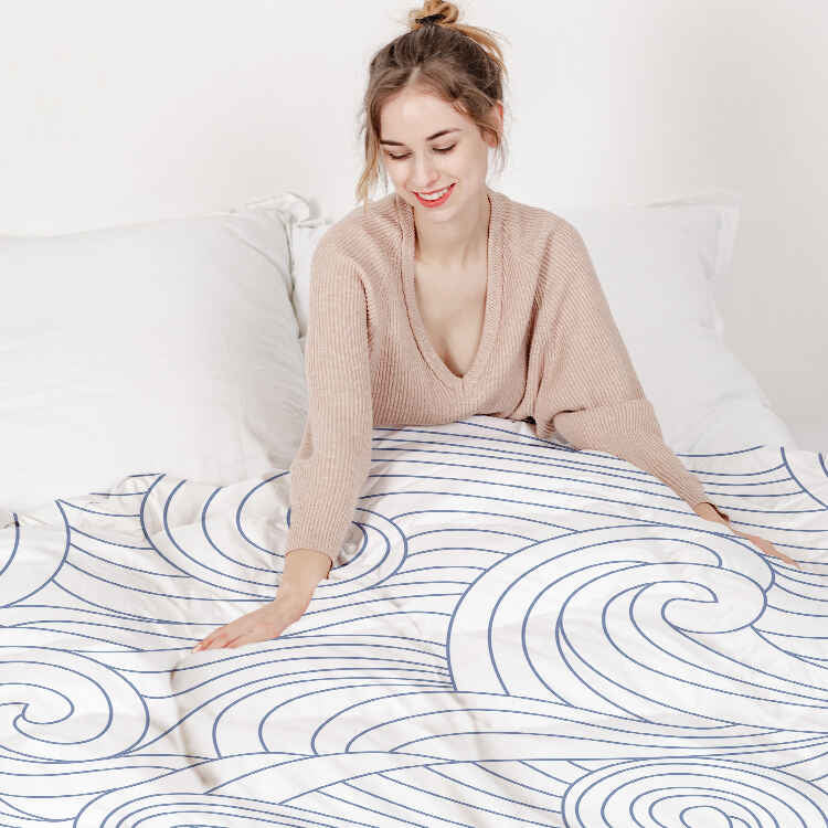 Set de ropa de cama con manta terapéutica ondas azules