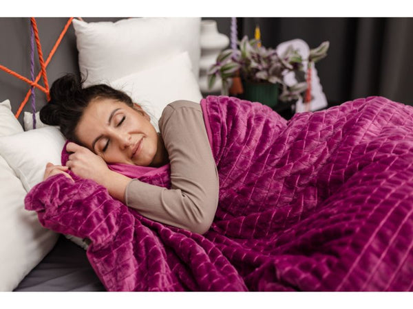 Was ist die beste Schlafposition mit einer Gewichtsdecke?