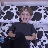 Cuscino sanitario con motivo a macchie di mucca per bambini