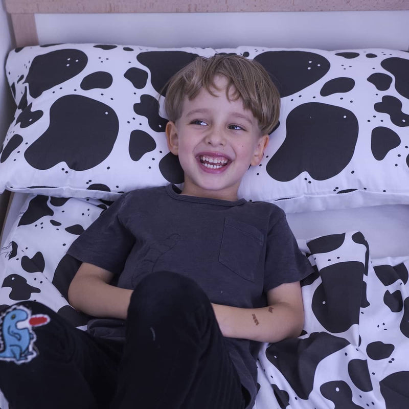 Cuscino sanitario con motivo a macchie di mucca per bambini