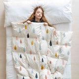 Therapy blanket and bedding set with colorful drops.