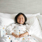 Therapy blanket and bedding set with colorful drops.