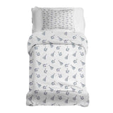 Therapy blanket bedding set, white, with boho earrings.