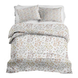 Set di biancheria da letto con coperte terapeutiche e delicati rami colorati