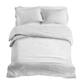 Therapy blanket and bedding set, white with small shapes.