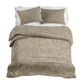Therapy blanket bedding set, beige with black leaf pattern.