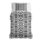Set de ropa de cama con mantas terapéuticas y formas negras