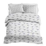 Therapy blanket bedding set, white, with boho earrings.