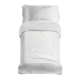 Therapy blankets and bedding set with delicate bouquets of flowers.