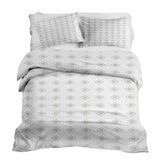 Therapy blanket and bedding set, white with green circles.