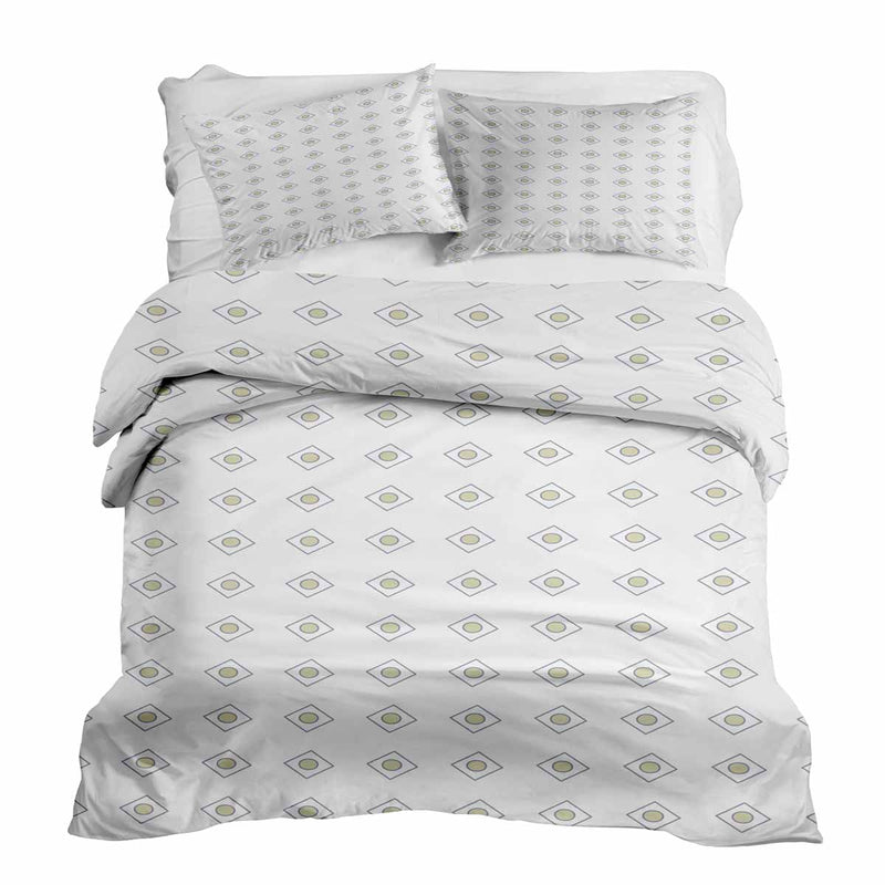 Therapy blanket and bedding set, white with green circles.