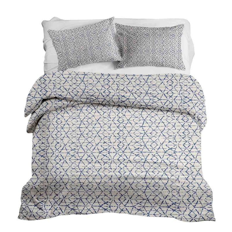 Therapy blanket and bedding set, white with delicate blue shapes.