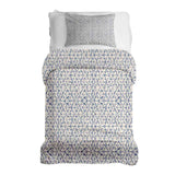 Therapy blanket and bedding set, white with delicate blue shapes.