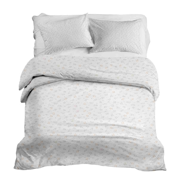 Therapy blankets and bedding set with delicate bouquets of flowers.