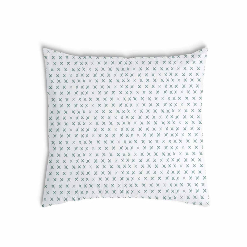 Health pillow, white with green crosses.