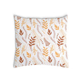 Almohada de salud blanca con ramas otoñales
