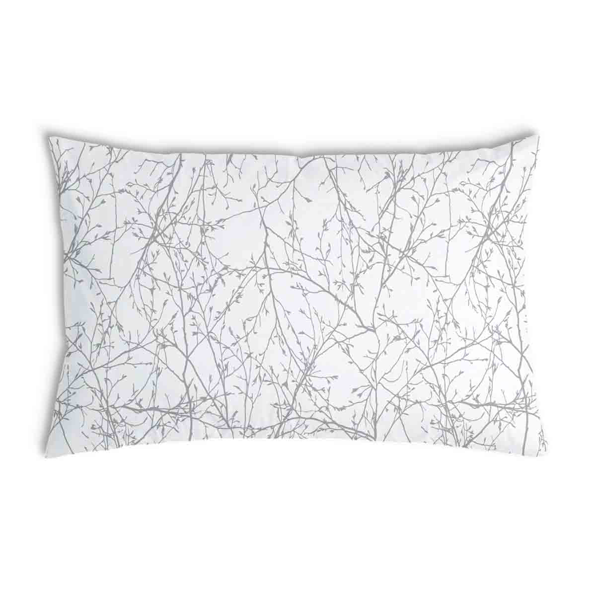 Almohada de salud blanca con delicadas ramas grises