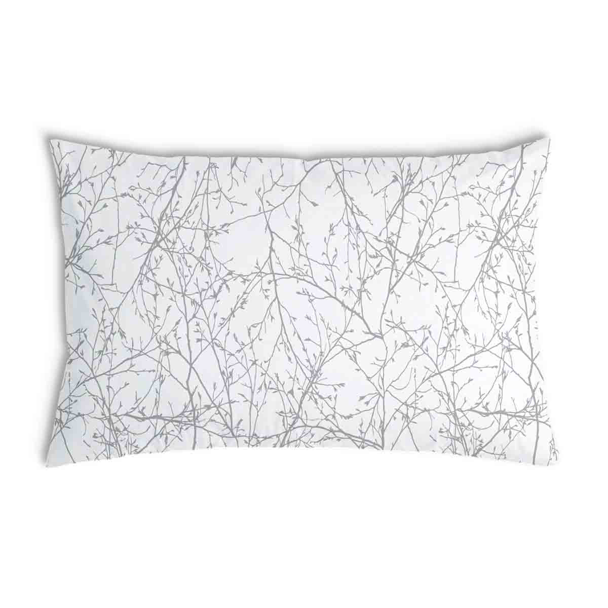 Almohada de salud blanca con delicadas ramas grises