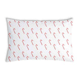 Almohada de salud blanca con bastones de caramelo