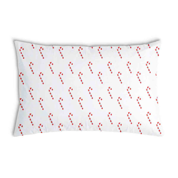 Almohada de salud blanca con bastones de caramelo