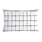 Almohada de salud blanca con cuadros negros