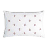 Almohada de salud blanca con estrellas rosas