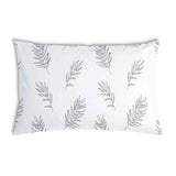 Almohada de salud blanca con ramas grises
