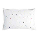 Cuscino sanitario bianco con forme colorate