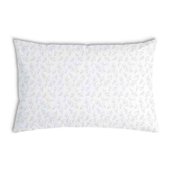 Almohada de salud blanca con delicadas ramas