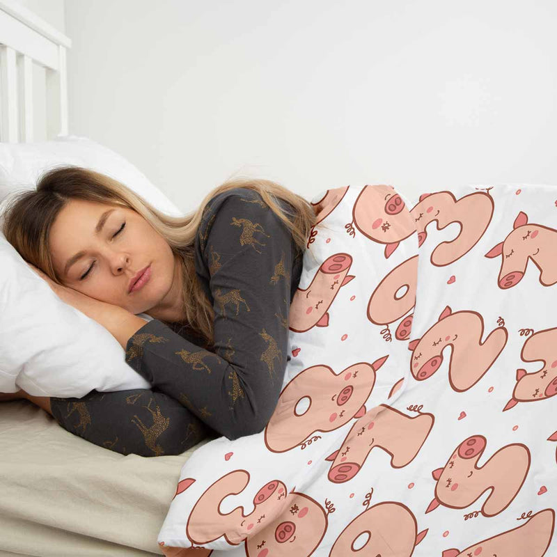 Therapy blanket and bedding set, white with numbers and pigs.