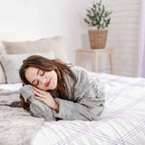 Therapy blanket bedding set, white with purple stripes.