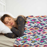 Therapy blanket and bedding set, colorful with leopard print.