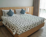 Therapy blanket and bedding set, white with grey dots.