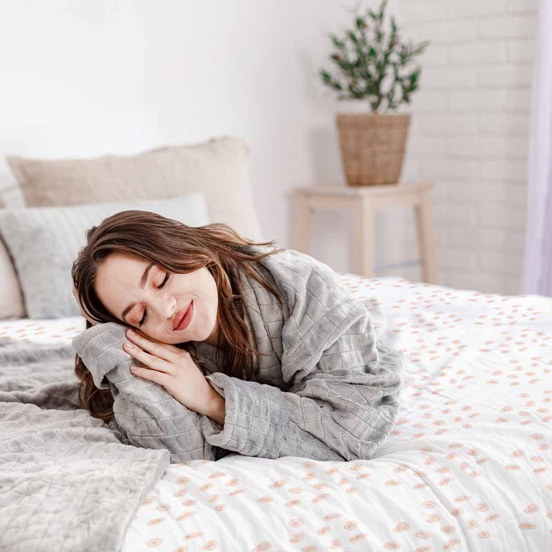 Therapy blanket and bedding set with orange dots.
