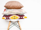 Health pillow beige with abstract face