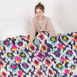Therapy blanket and bedding set, colorful with leopard print.