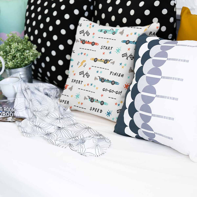 White health pillow with racing cars