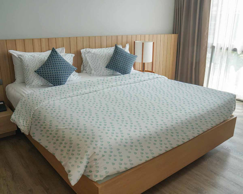 Therapy blanket and bedding set with blue drops.