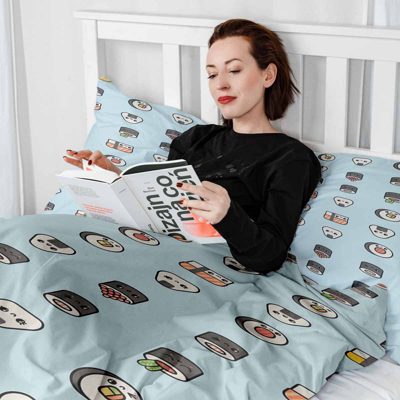 Therapy blanket and bedding set, light blue with sushi.