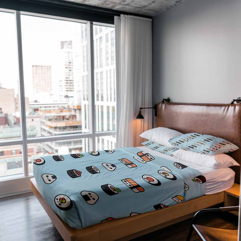 Therapy blanket and bedding set, light blue with sushi.