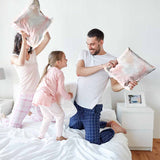 Health pillow white with pink feathers