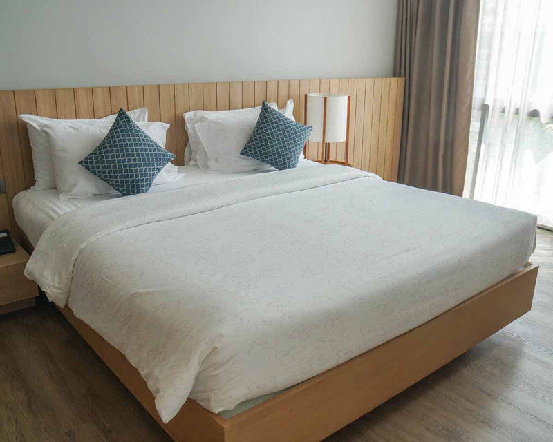 Therapy blanket and bedding set, white with delicate flowers.